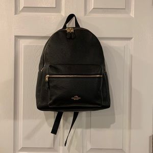 Authentic Black Coach Backpack with gold accents